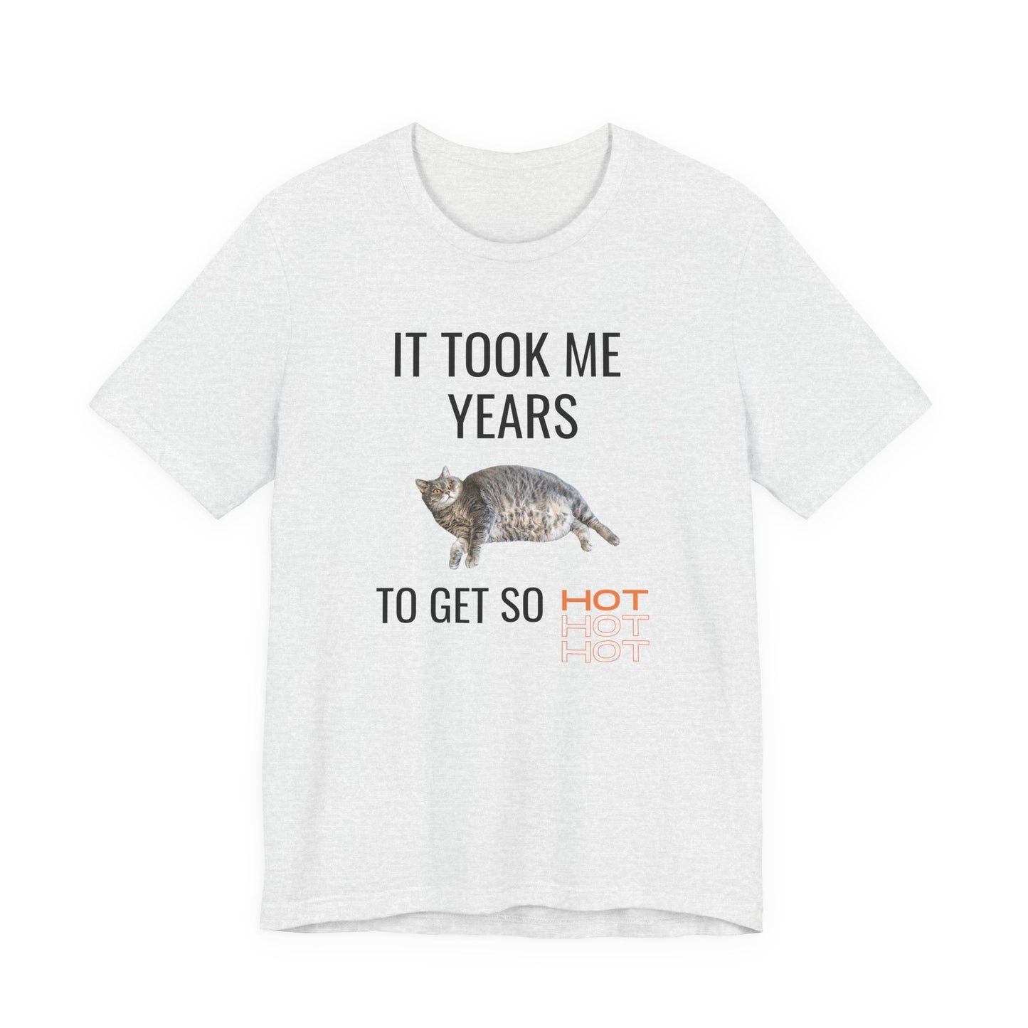 Funny unisex t-shirt with a chubby cat and the quote “It Took Me Years to Get This Hot” – soft cotton tee for cat lovers and snack champions
