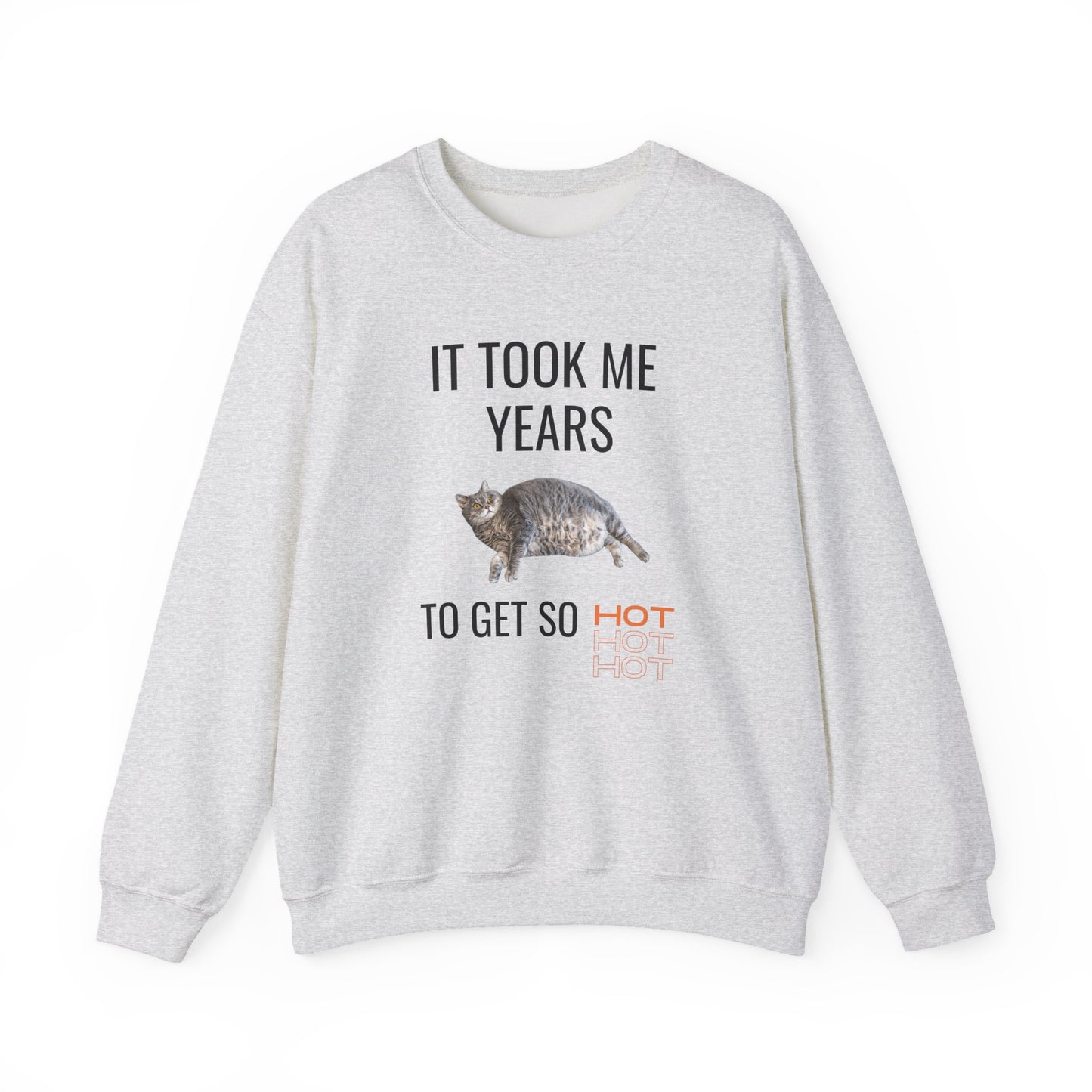 Unisex sweatshirt featuring a funny chubby cat and the quote "It Took Me Years to Get This Hot" – cozy and soft with durable DTG print